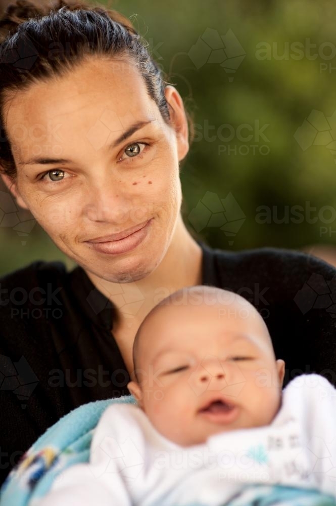 Baby with Indigenous Australian Mother - Australian Stock Image