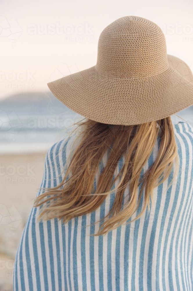 Back of girl looking at the ocean - Australian Stock Image