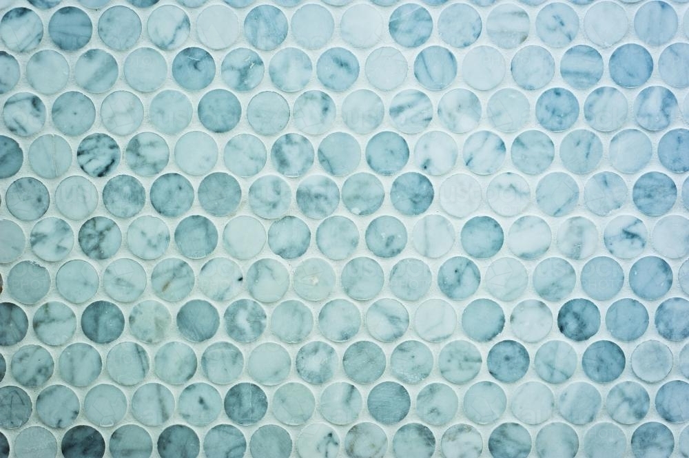 background of round blue tiles - Australian Stock Image