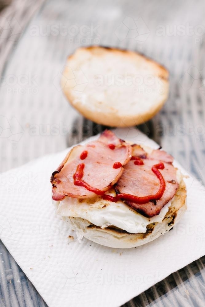 bacon and egg burger, bbq breakfast - Australian Stock Image