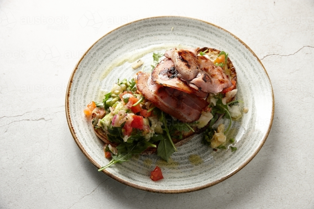 Bacon and healthy salad on toast - Australian Stock Image