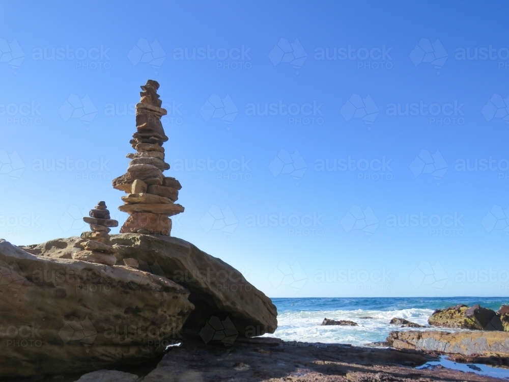 Balancing Stones on the ocean front - Australian Stock Image
