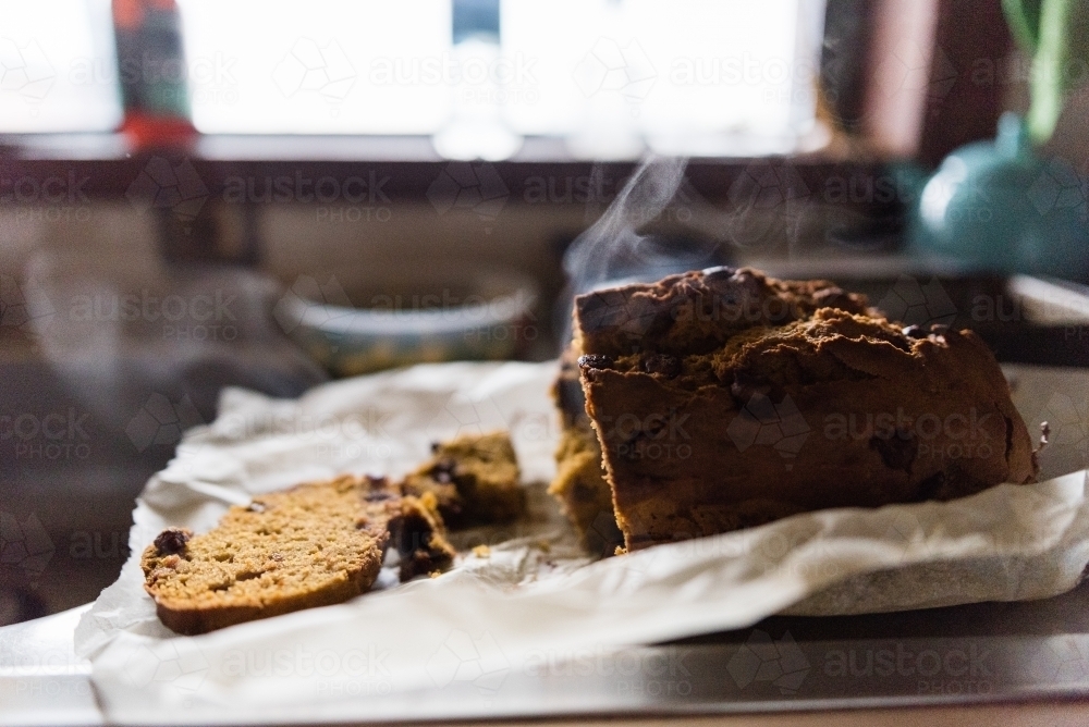 Banana bread cooling on bench - Australian Stock Image