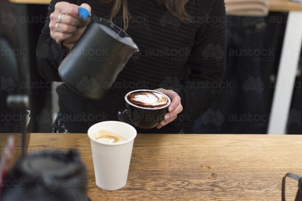 Barista Pouring Coffee - Australian Stock Image