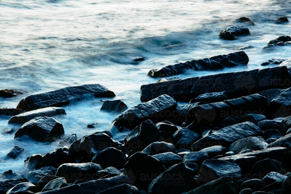 Image of Basalt Rocks and Waves at Burleigh Head - Austockphoto