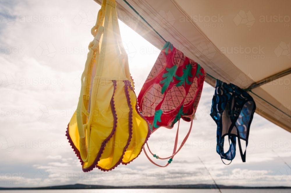 bathers drying in the sun - Australian Stock Image