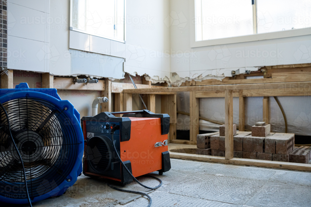 Bathroom renovation - big exhaust fans with bathtub scaffolding - Australian Stock Image