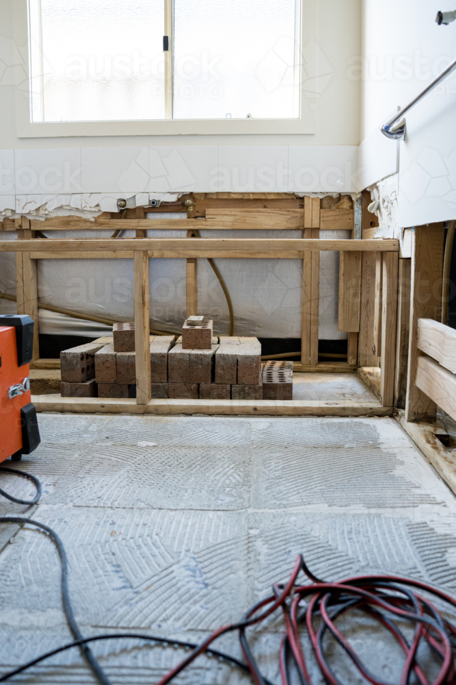 Bathroom renovation - big exhaust fans with bathtub scaffolding - Australian Stock Image
