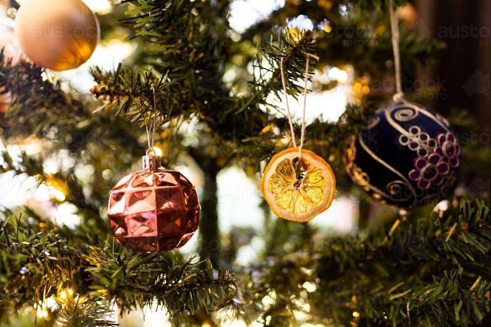 Baubles and dried citrus orange slice Christmas tree ornaments - Australian Stock Image