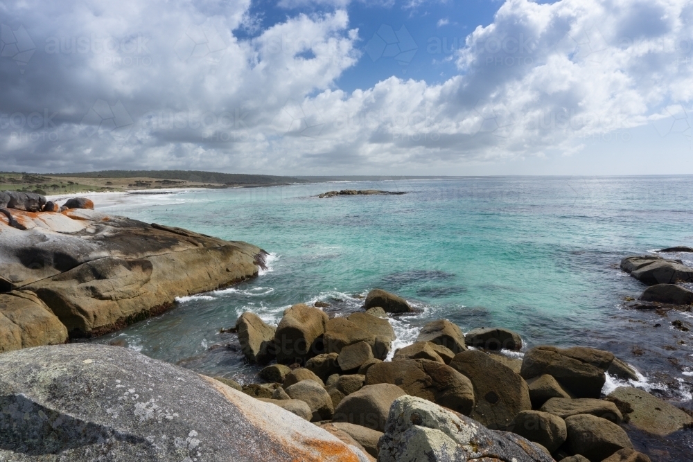 Bay of Fires on a sunny day with clouds in a blue sky - Australian Stock Image