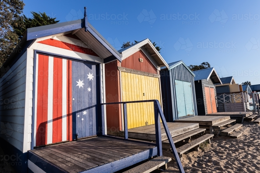 Beach boxes at Mornington Mills Beach on the Mornington Peninsula, a famous tourist attraction - Australian Stock Image