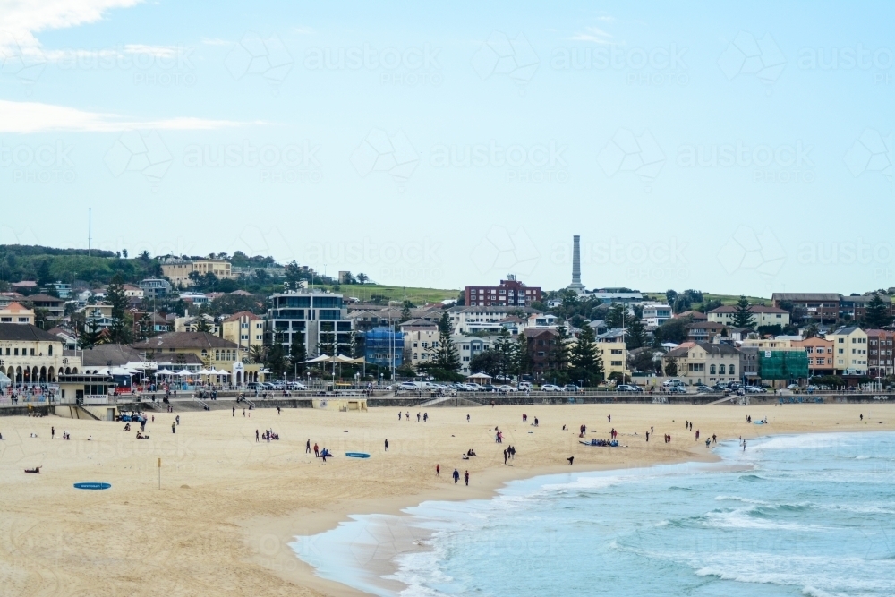 Beach scene with houses and apartments in background - Australian Stock Image
