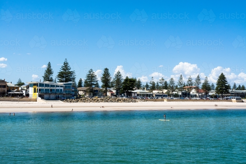 Beach shot with paddle boarder - Australian Stock Image
