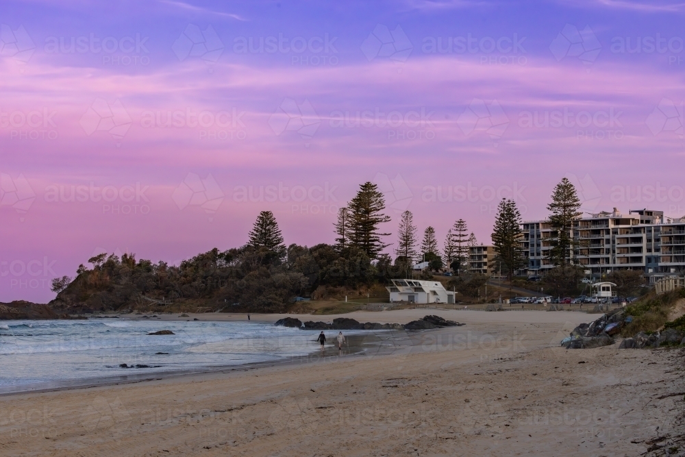 Beach sunset at Port Macquarie NSW with pink sky - Australian Stock Image