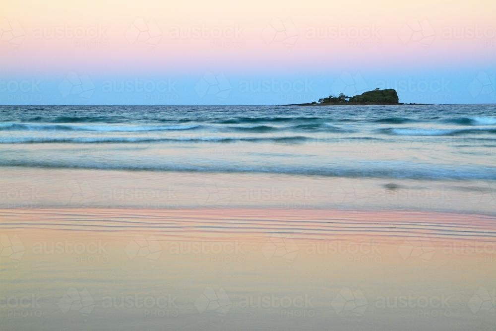 Beach sunset with pastel colours - Australian Stock Image