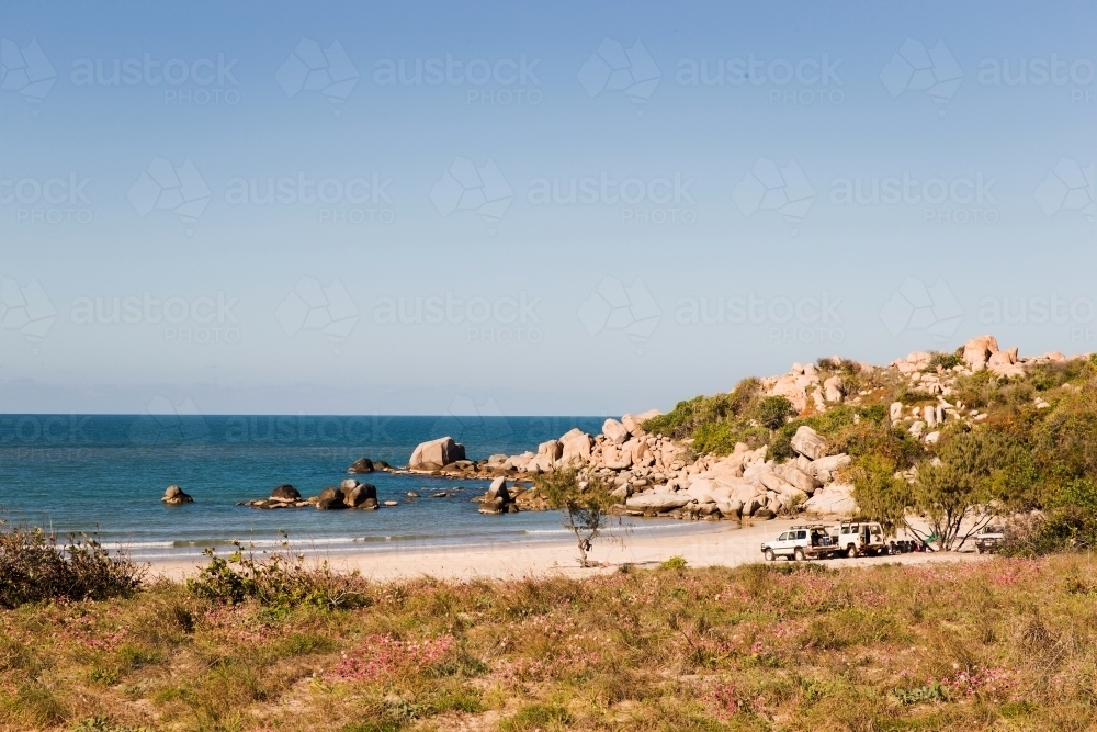 Beach with white sand, coastline and rock formations - Australian Stock Image