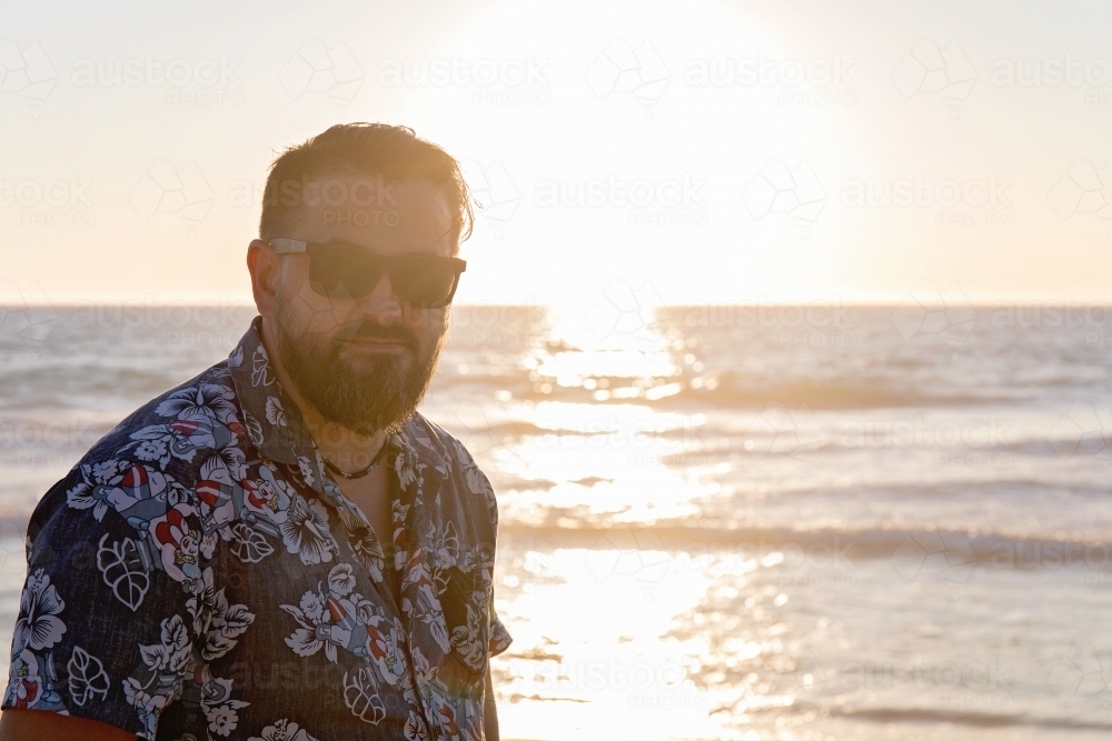 Bearded Man On The Beach At Sunset - Australian Stock Image