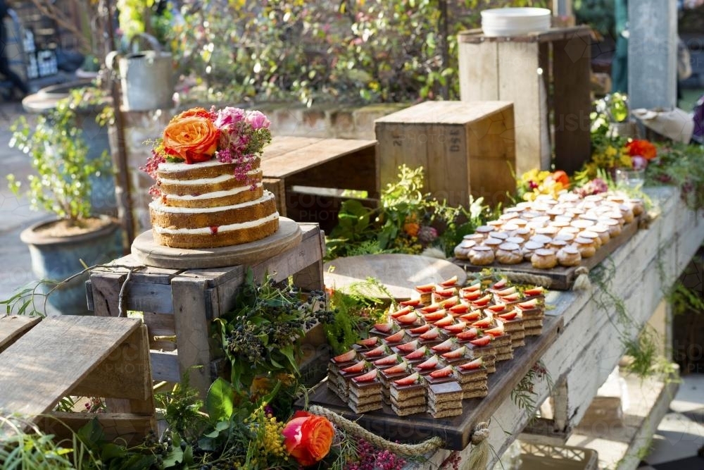 Beautiful cakes at birthday with flowers - Australian Stock Image