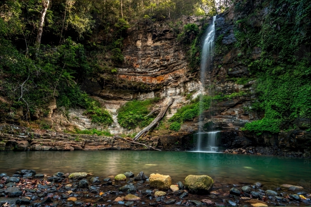 Beautiful Clover Falls and it's stony waterhole pool - Australian Stock Image