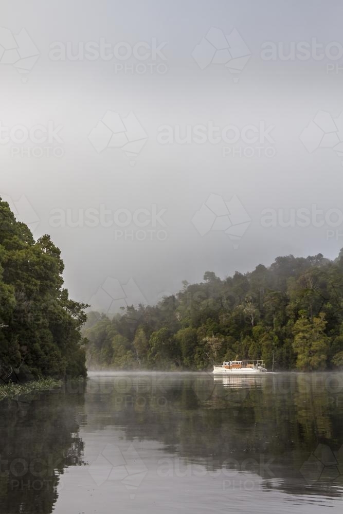 Beautiful old wooden boat on the water - Australian Stock Image