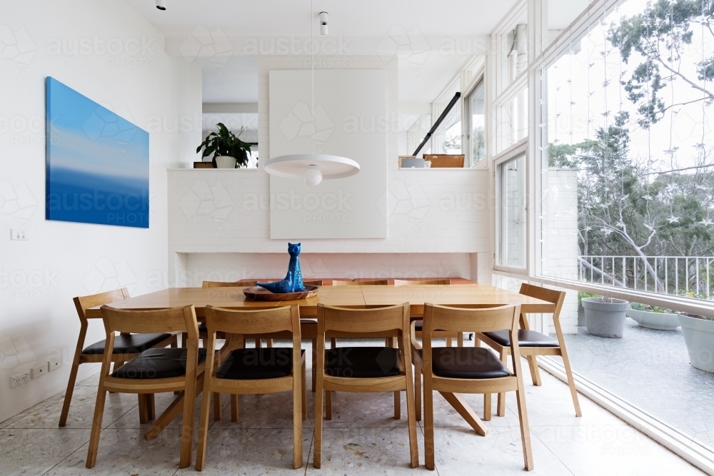 Beautiful scandinavian style dining room in mid century modern home - Australian Stock Image