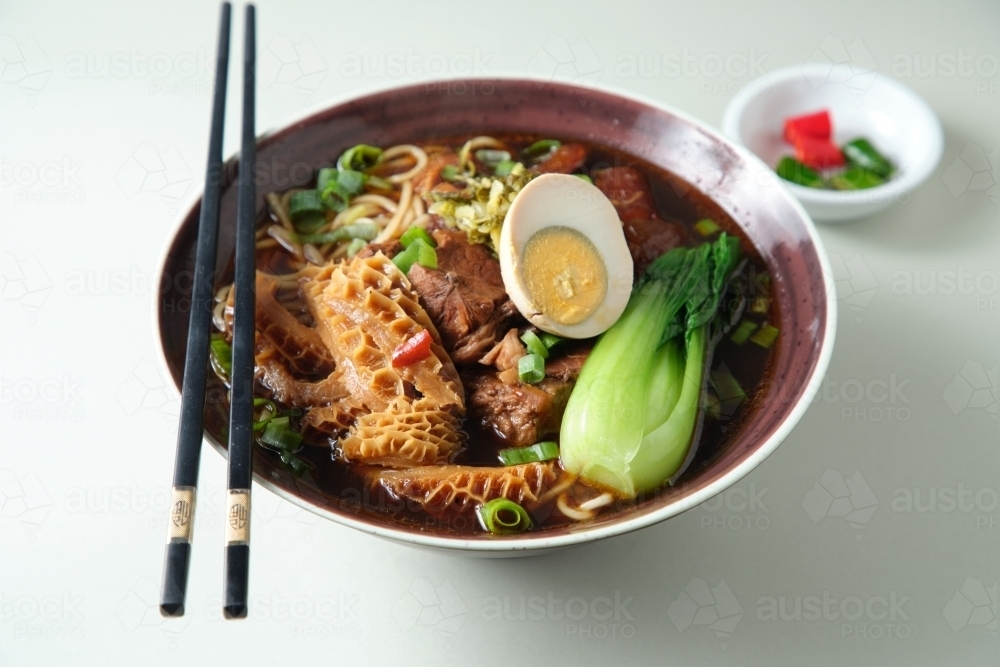 Image of Beef gravy and tripe and tendon noodle soup Austockphoto