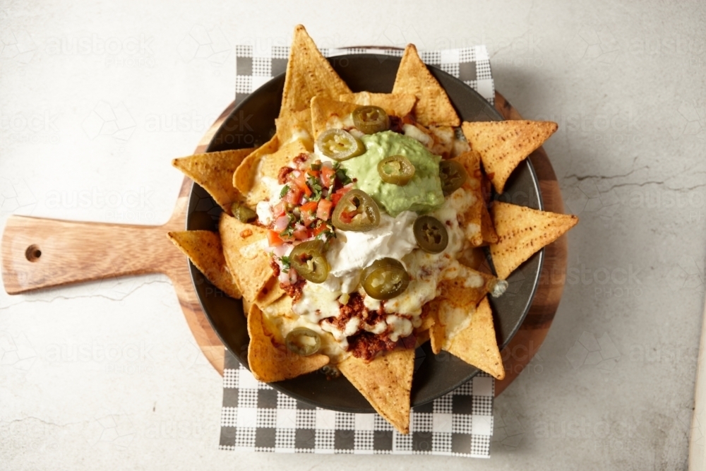 Beef nachos on plate - Australian Stock Image
