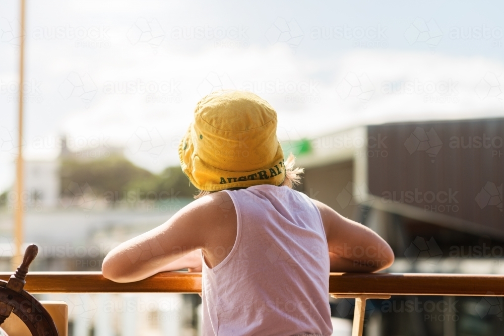 behind view of girl on ferry in Sydney - Australian Stock Image