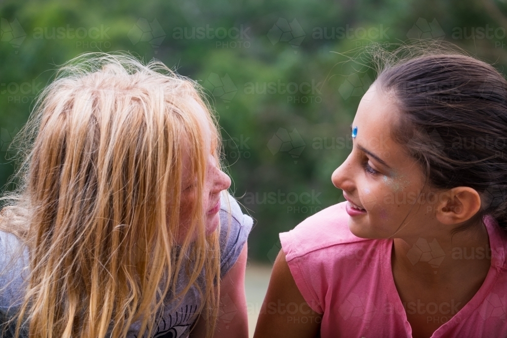 Friends Looking Image of Best friends looking at each other - Austockphoto