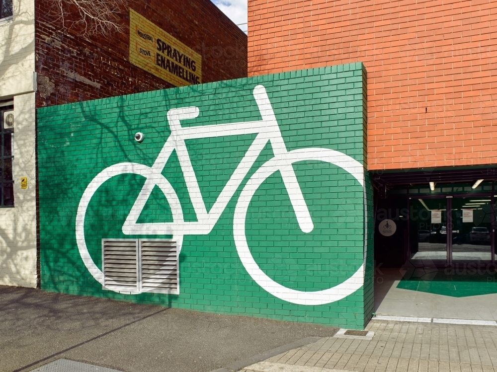 Bicycle graphic on wall in city - Australian Stock Image