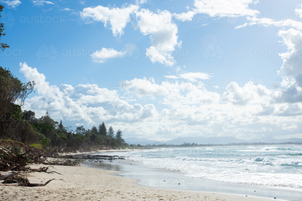 Big sky and waters edge at Byron Bay - Australian Stock Image