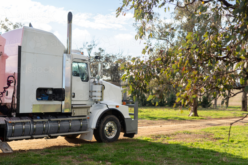 Big white truck with tool box open on a farm - Australian Stock Image