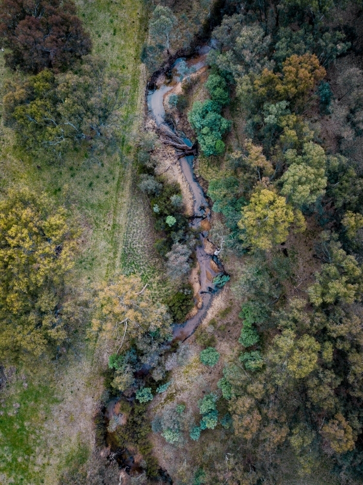 Birds eye view of small creek - Australian Stock Image