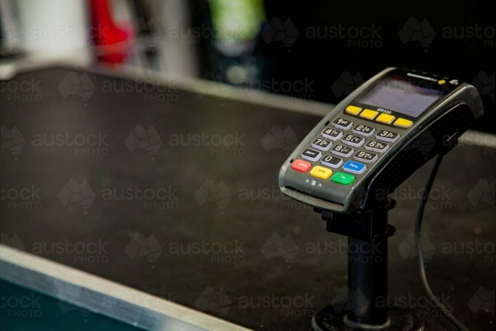 Image of Black copy space with credit card terminal at checkout ...