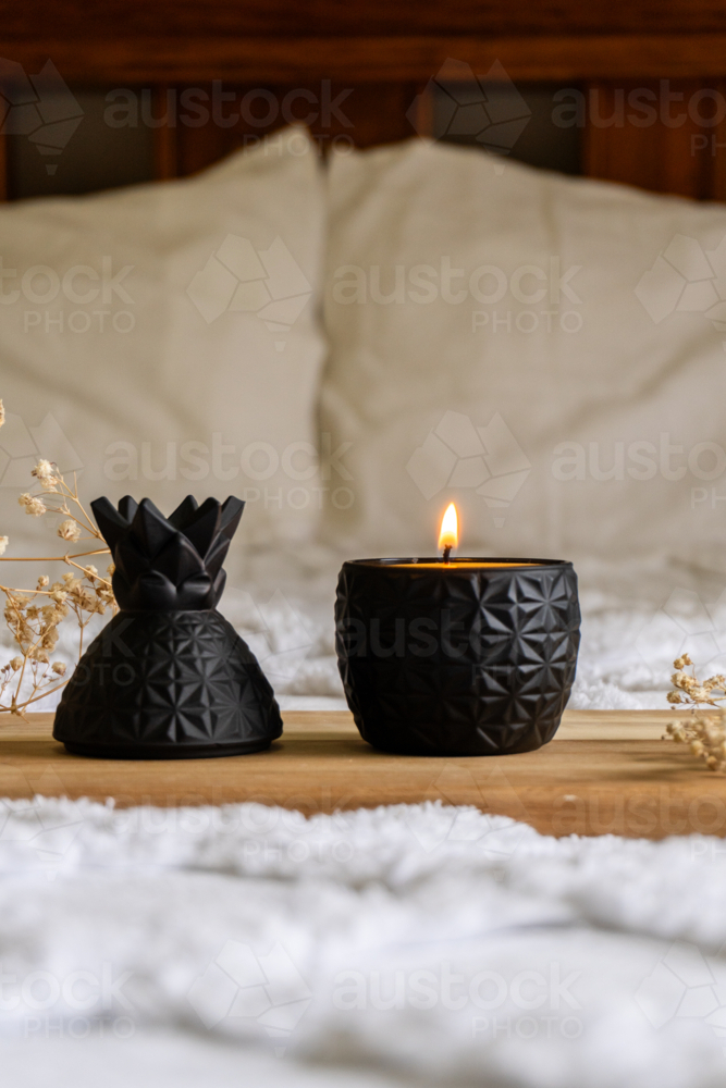 Black decorative pineapple candle - Australian Stock Image