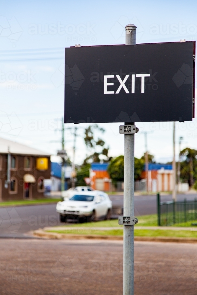 Black exit sign with copy space in country town - Australian Stock Image