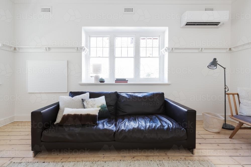 Blank white framed art in contemporary interior styled living room - Australian Stock Image