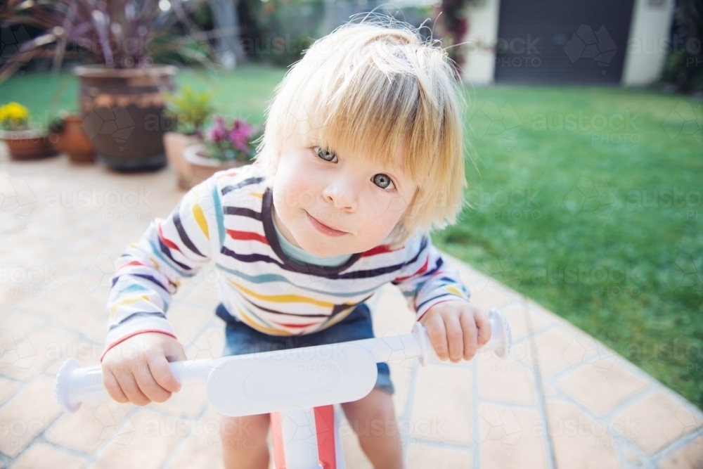 Blonde Boy on Bike - Australian Stock Image