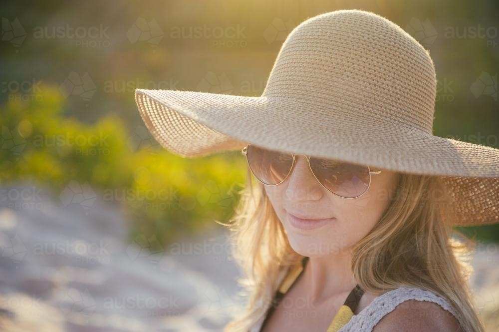 Blonde Girl on the Beach at Sunset - Australian Stock Image