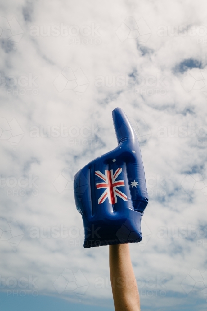 blow up fan hand for supporting Australian sports team, with flag print - Australian Stock Image