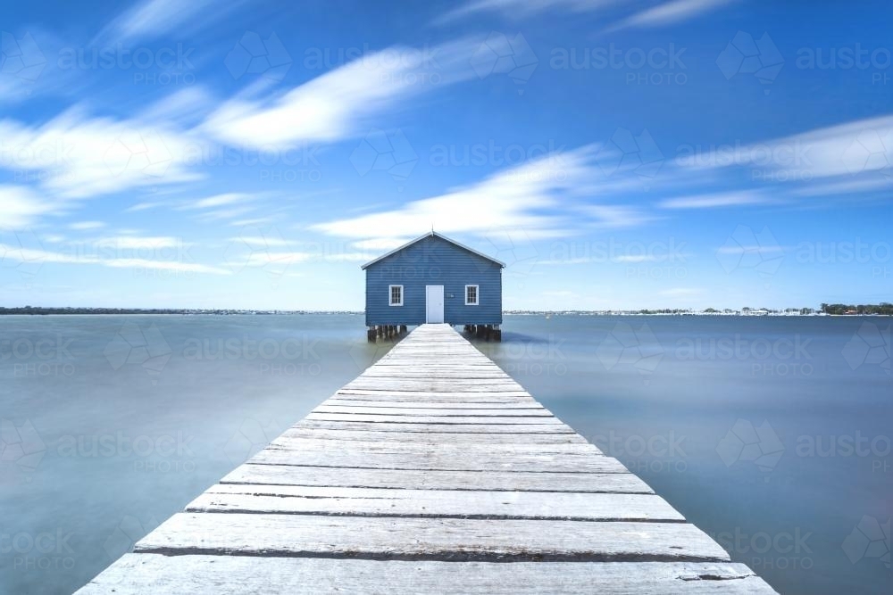 Blue boat house along Swan River - Australian Stock Image