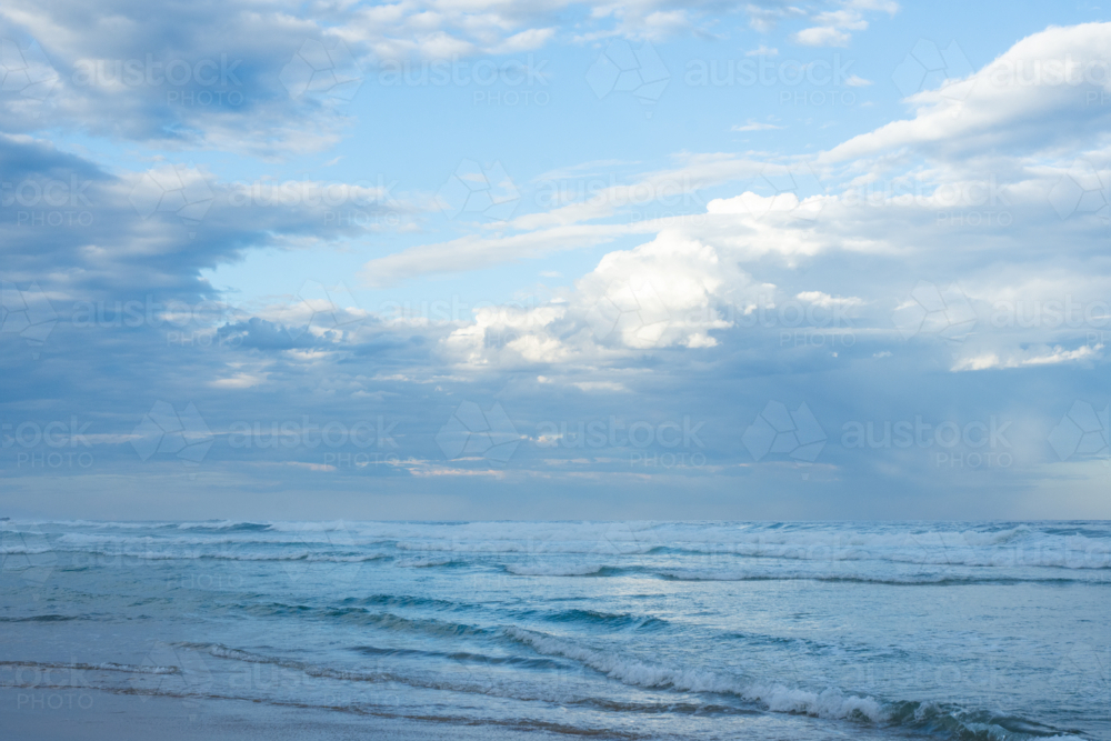 Blue ocean and atmospheric clouds - Australian Stock Image