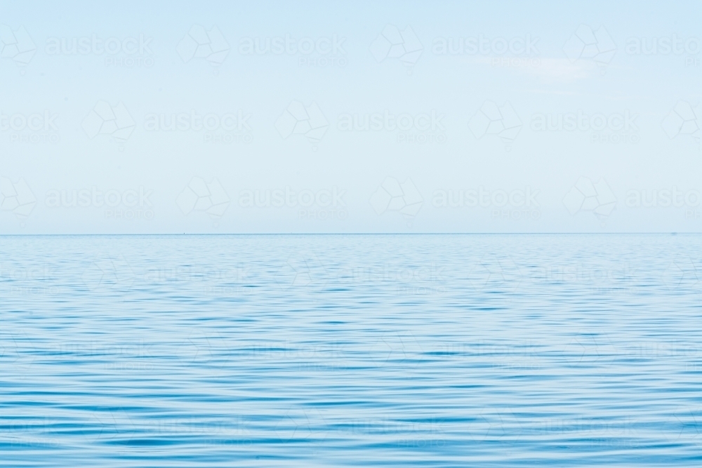 Blue sea and blue sky with clear horizon - Australian Stock Image