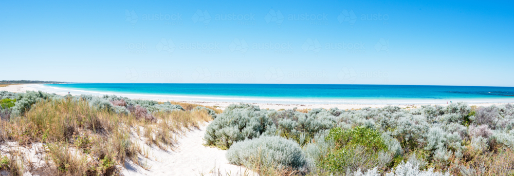 Blue skies white sands & turquoise ocean at two rocks beach - Australian Stock Image