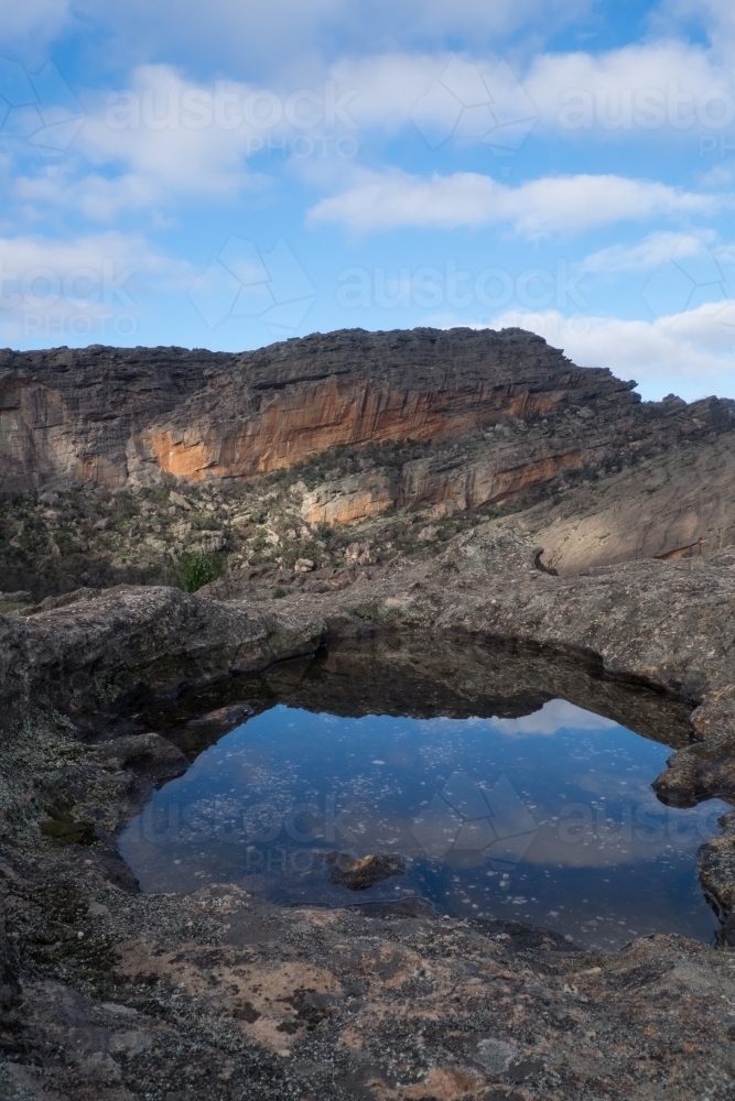 Blue sky reflection on Mount Stapylton - Australian Stock Image