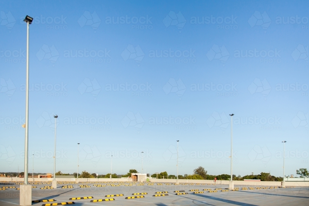 Blue sky with copy space in empty car park - Australian Stock Image