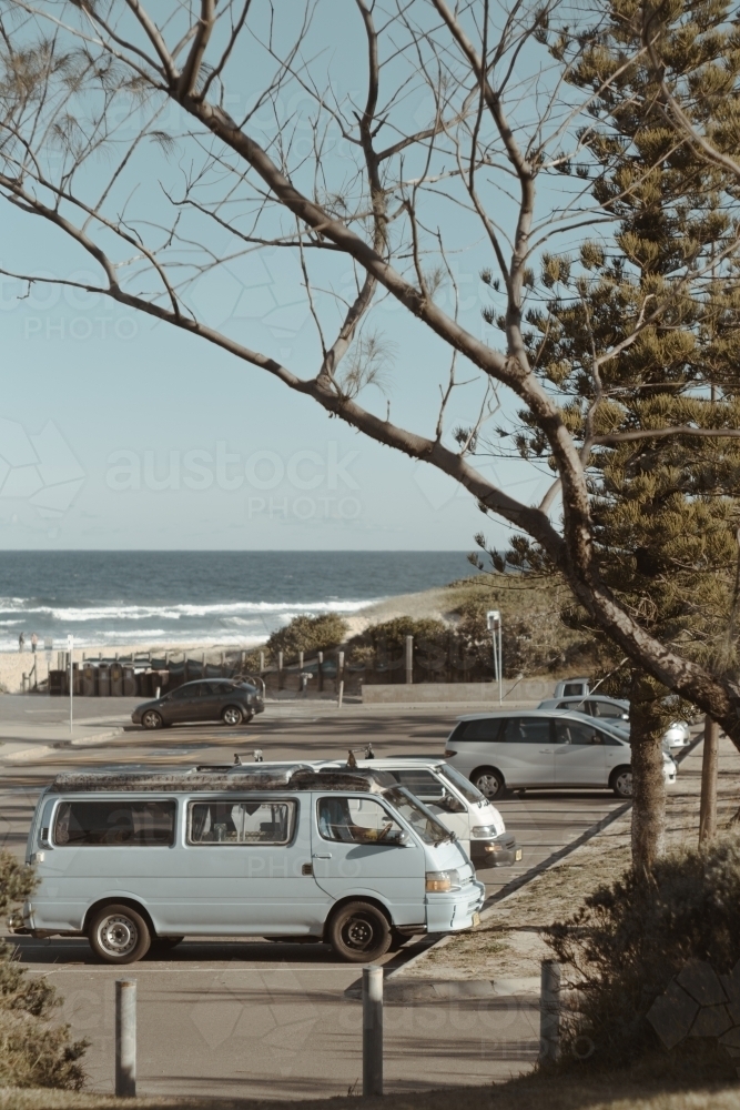 Blue van parked at Redhead Beach carpark - Australian Stock Image