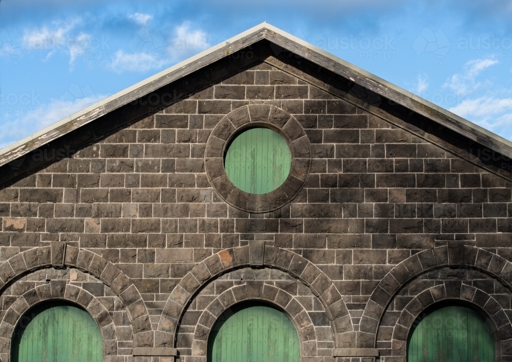 Bluestone warehouse with arches - Australian Stock Image