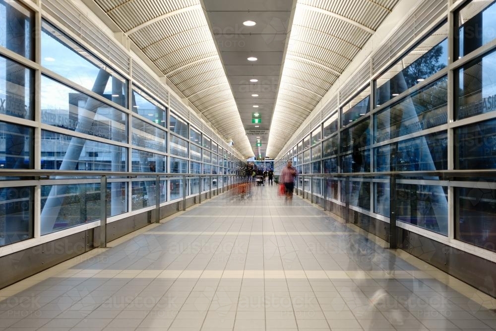 Blurred People in Airport Overpass - Australian Stock Image