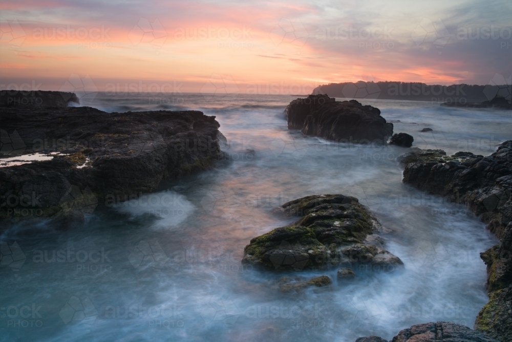 Blurred waves at dawn - Australian Stock Image